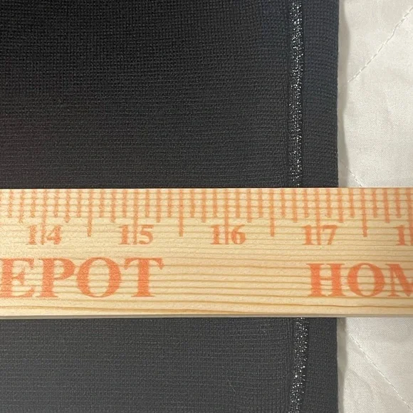 Marc Cain knit black knee length skirt with metallic silver side seams. - Picture 8 of 14